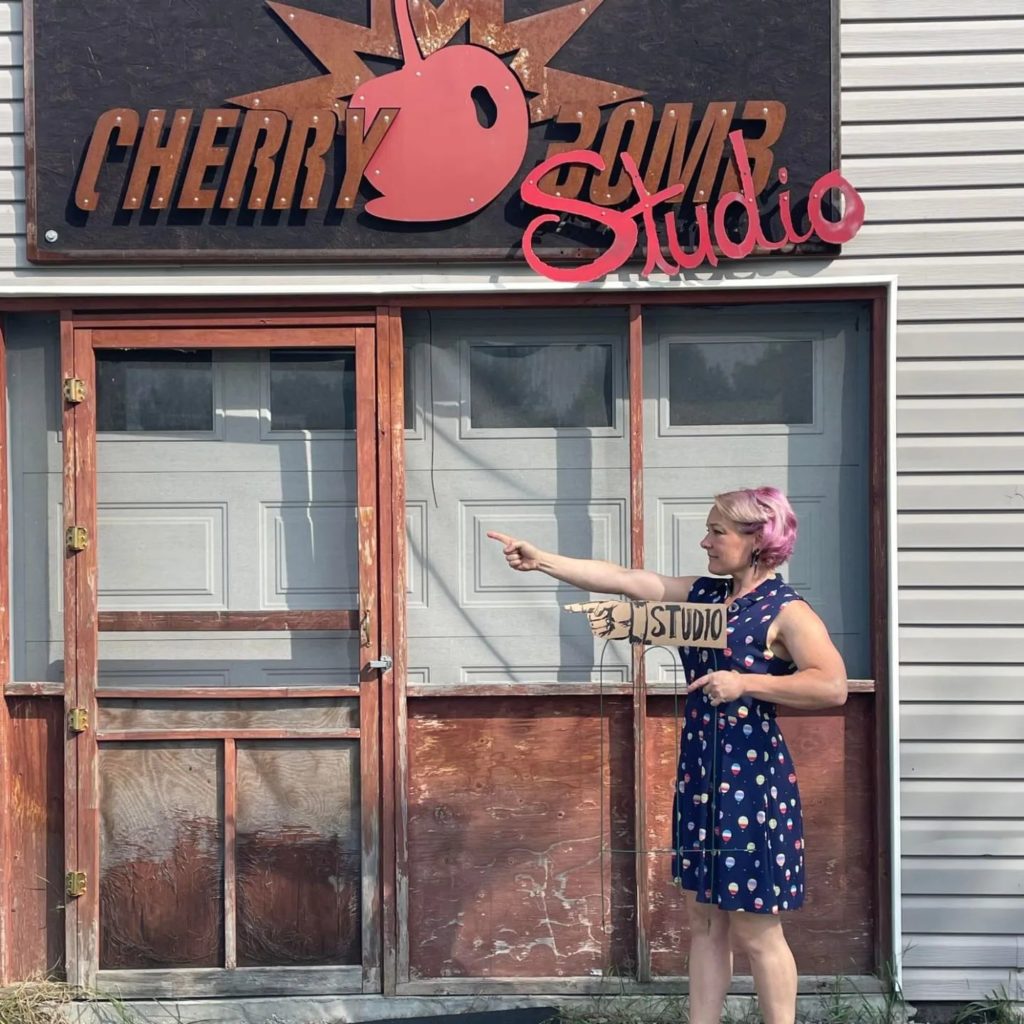 Artist Sara Léger in front of Cherry Bomb Studio in South Glengarry, Ontario