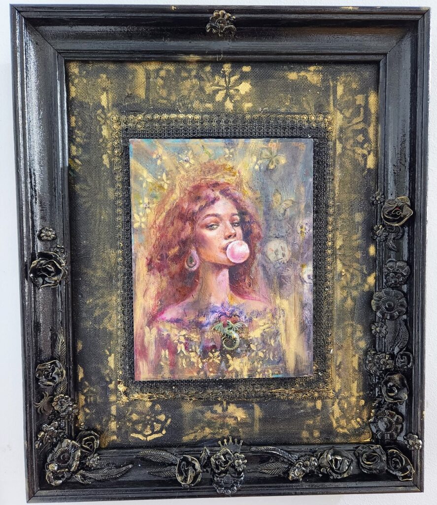 Painting By Sara Leger in handsculpted frame of a red headed woman blowing a bubble
