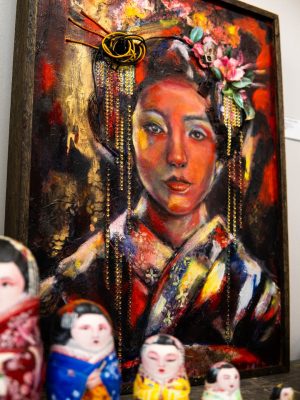 Art by Sara Leger at Cherry Bomb Studio in Lancaster On. Of a Geisha with found objects as hair ornaments